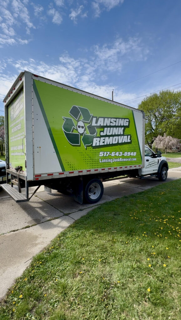 Lansing Junk Removal Truck in driveway - booking Lansing Junk Removal